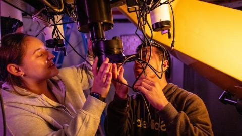 Astrophysics Minor students checking wires